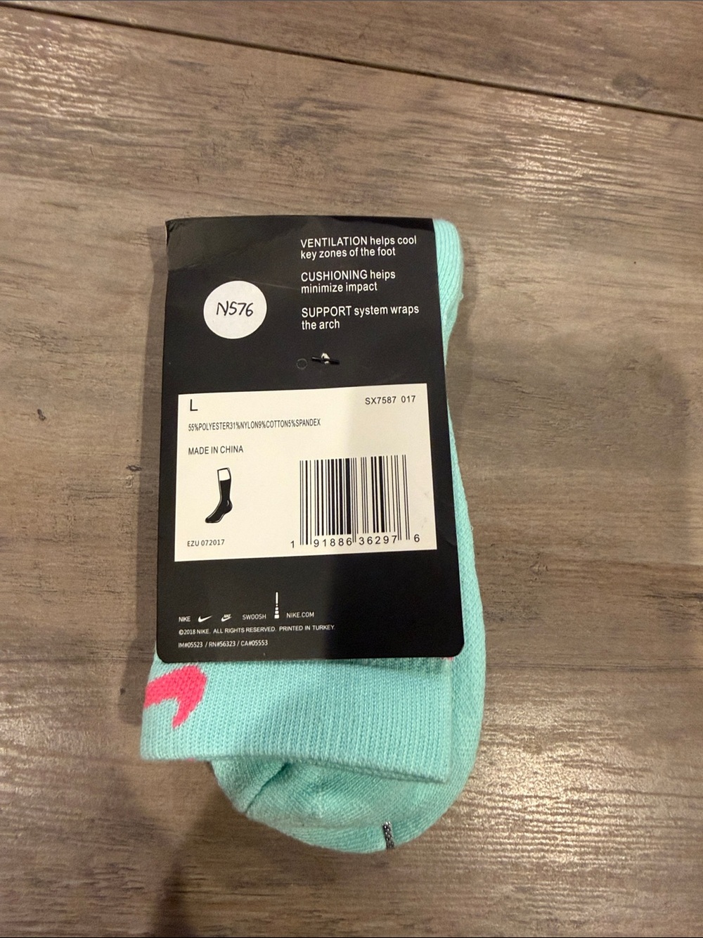Nike Men’s Mint Green Crew Socks with Pink Swoosh